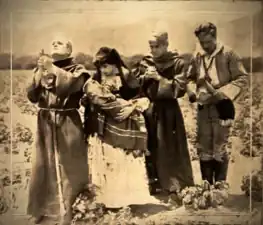 Jose and Carmen receive the Padre's blessing.