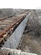 An abandoned railroad bridge built in 1927