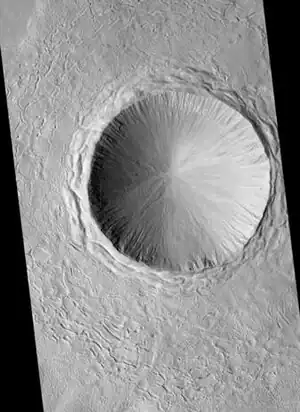 Crater in the Adamas Labyrinthus Region, as seen by HiRISE.  The original image shows many interesting details.