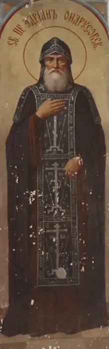 Icon of St. Adrian of Ondrusov, wearing the black koukoulion. The lapets can be seen on his shoulders.