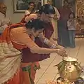 This is Aiya and Amma doing Puja