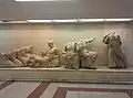 Sculptures exhibited on the concourse level. The sculptures depict Helios' chariot, Dionysus, Demetra, Persephone and Hebe or Artemis.