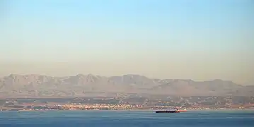 Haql on the coast of the Gulf of Aqaba between the Syrian region and Arabian and Sinai Peninsulas, with the mountains in the background