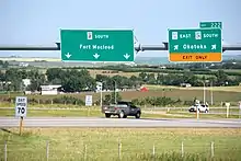 Near  De Winton, Highway 2A splits southwest toward the bedroom community of Okotoks, Alberta, connecting it to Calgary.