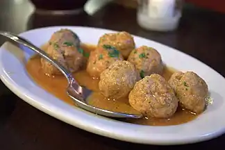 Albondigas are small meatballs prepared in the cuisines of Mexico, Spain and South America. Pictured is albondigas in Spain.