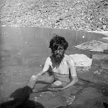 Crowley bathing in a spring during the K2 Expedition, 1902