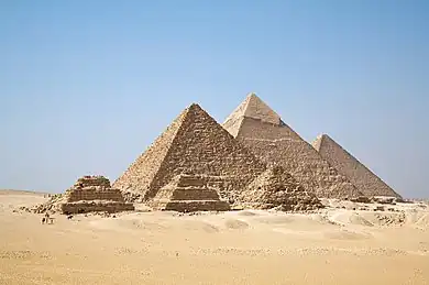 A view of the pyramids at Giza. From left to right, the three largest are: the Pyramid of Menkaure, the Pyramid of Khafre and the Great Pyramid of Khufu