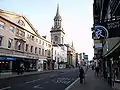 View of All Saints Church from the west along the High Street.