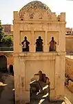 Polylobed arches at the Almoravid Qubba in Marrakesh, Morocco (early 12th century)