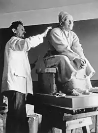 Sculptor Alpo Sailo (1877–1955) working on a statue of Paraske, c. 1935–1936