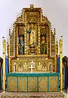 The reredos at the east end. Removed from St Thomas's , Portman Square made to the design of Cecil Greenwood Hare, Bodley's last partner and successor to his practice.