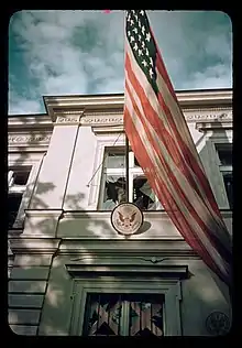 American embassy in Warsaw and visible shattered window during the German air raid.