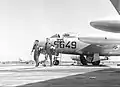 Two Israeli pilots after getting out of their Dassault Ouragan fighter jets in July 1956