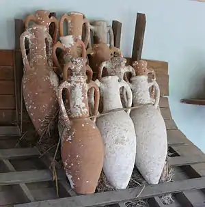 Bronze Age amphorae from shipwrecks near Bodrum, Turkey, with rack and roping device illustrating how they might have been kept from shifting