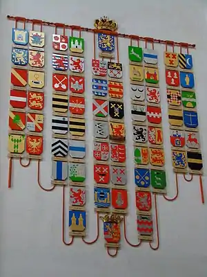 Coats of arms with the titles of the Dutch head of state