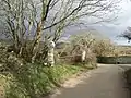 Fig. b7: a cross carved onto a standing stone next to the lane from Treloquithack to Brill