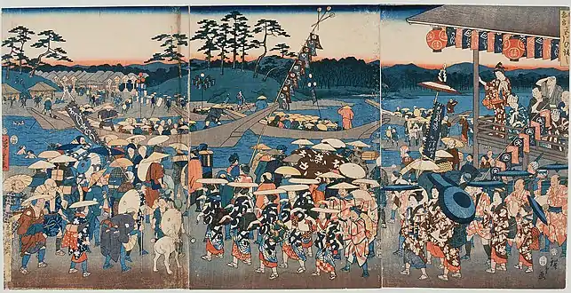 A boarding place for a ferry on the Miya River, which is crowded with people visiting Ise Grand Shrine. By Hiroshige