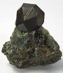 Image 11Black andradite, an end-member of the orthosilicate garnet group. (from Mineral)