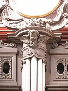 Cherub on the organ pipe