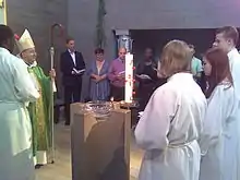 Confirmation being administered in an Anglican church