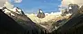 Anniversary Peak (left), Hound's Tooth/Marmolata Spire (centered) in Bugaboo Glacier, and Snowpatch Spire (right). East aspect as viewed from Bugaboo Lodge.