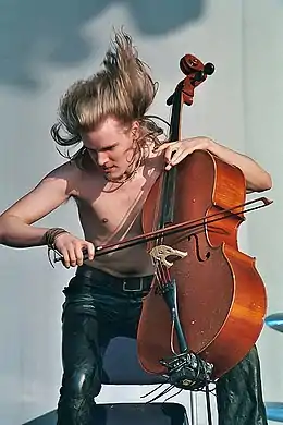 Image 36Apocalyptica's Perttu Kivilaakso playing metal music live (from Culture of Finland)