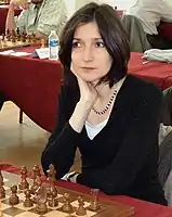 Arakhamia-Grant staring while playing chess