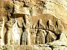 Ardashir I receiving the badge of kingship over a fire shrine from the Zoroastrian supreme god Ahura Mazda