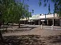 One side of the main street of Ariah Park - note the peppercorn trees