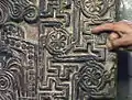 Khachkar with hexafoils, swastikas and sauwastikas in Sanahin, Armenia