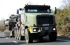 A British Army Oshkosh M1070F and a 7-axle King GTS 110/7 semi-trailer