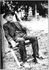 Black and white photograph of Arthur Corlette seated.