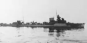 Starboard side view of the Italian destroyer Artigliere. The ship was stopped, abandoned and on fire forward after an engagement with the British cruiser HMS Ajax. The Artigliere was sunk by the cruiser HMS York on the following morning.