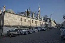 Exterior of the Atik Valide Mosque complex, with the madrasa on the left