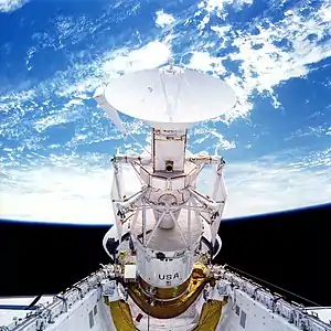 The spacecraft in a deployment position in Atlantis' payload bay