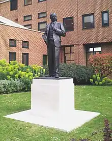 A statue of Clement Attlee in bronze