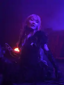 Lead singer, EXO-CHIKA, performing at Mang'Azur in 2013