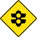 (W3-Q01) Ramp Metering (or Roundabout Metering) Signals ahead (Used in Queensland)