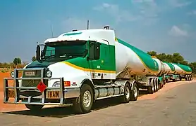 A tanker road train on an outback road. The Australian Road Rules apply to any heavy or light vehicle that operates on Australian roads.