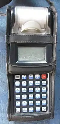 An electronic ticket machine used to read prepaid cards and issue tickets in Mumbai