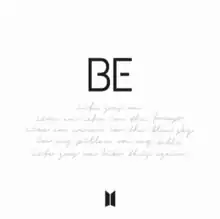 On a white background, the word "BE" in capital letters. Below, text in cursive writing reads "Life goes on/Like an echo in the forest/Like an arrow in the blue sky/On my pillow, on my table/Life goes on like this again".