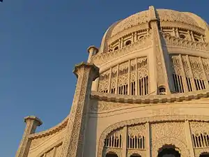 Image 11Symbols of many religions are carved in concrete relief on the exterior of the Bahá'í House of Worship in Wilmette.  The temple was designed by the architect Louis Bourgeois and constructed between 1921 and 1953. Image credit: ctot_not_def (photographer), Tobias Vetter (upload) (from Portal:Illinois/Selected picture)