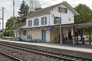 Two-story station building with hip roof