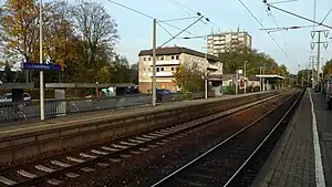 Double-tracked railway line with side platforms