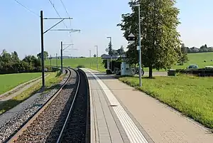 Single railway track, platform, and shelter