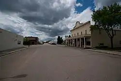 View to the west along Steele Ave.; the NRHP-listed Baldwin's Arcade is at right