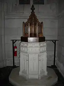 Baptismal font (1907).