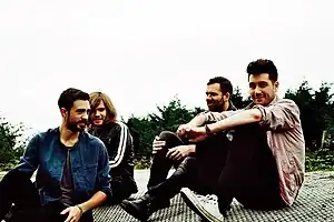 Bastille in 2013: Kyle Simmons, Chris Wood, Will Farquarson, and Dan Smith (left to right)