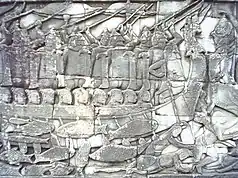 Depiction of a Cham–Khmer naval battle, stone relief at the Bayon.