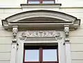 Pediment and adorned lintel